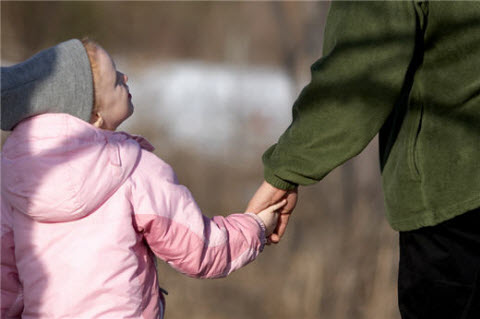 Dad and daughter walking