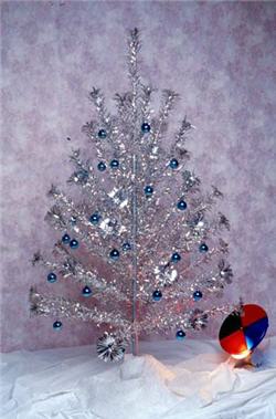 Popular in the 1960s and 1970s, the Aluminum Christmas Tree would change colors as the color wheel turned!